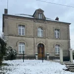 Façade en pierre d'une bâtisse juste avant les travaux de restauration de pierre